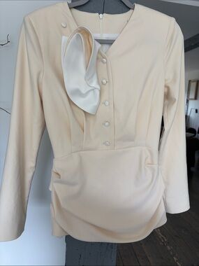 Women’s Cream Peplum Jacket with Button Front BY POST MERIDIEM beyond gorgeous